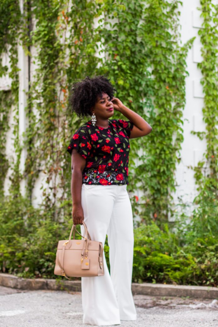 Blogger wearing Floral who what wear top and white pants